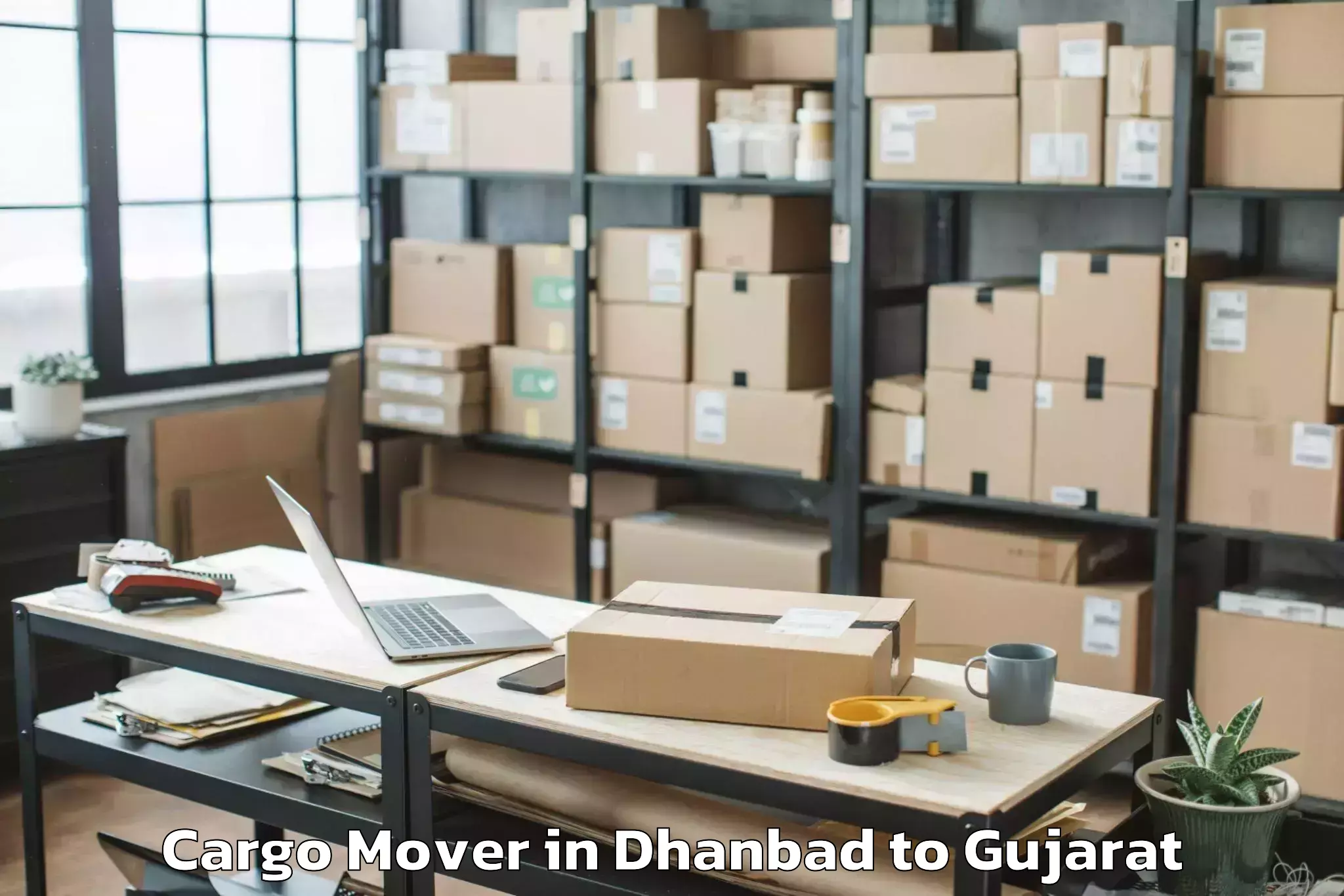 Reliable Dhanbad to Manavadar Cargo Mover